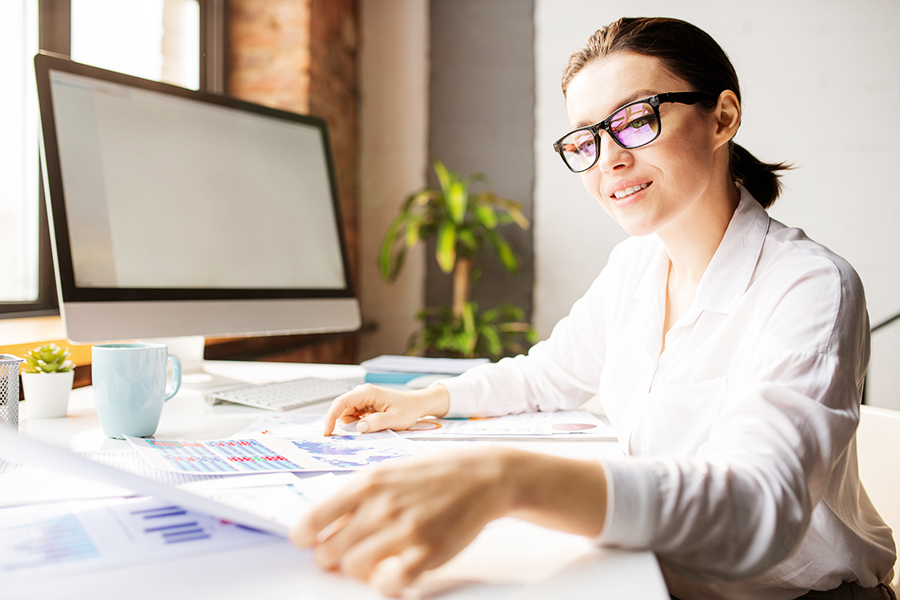Accountant by workplace Accountant reviewing documents