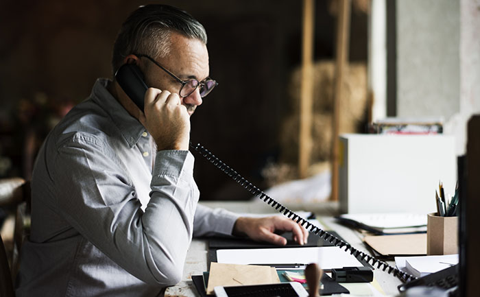Businesspeople Answering the Phone Call Businesspeople Answering the Phone Call
