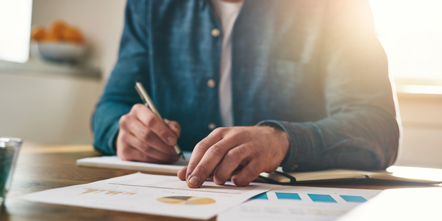 tax-professional-reviewing-charts tax-professional-reviewing-charts