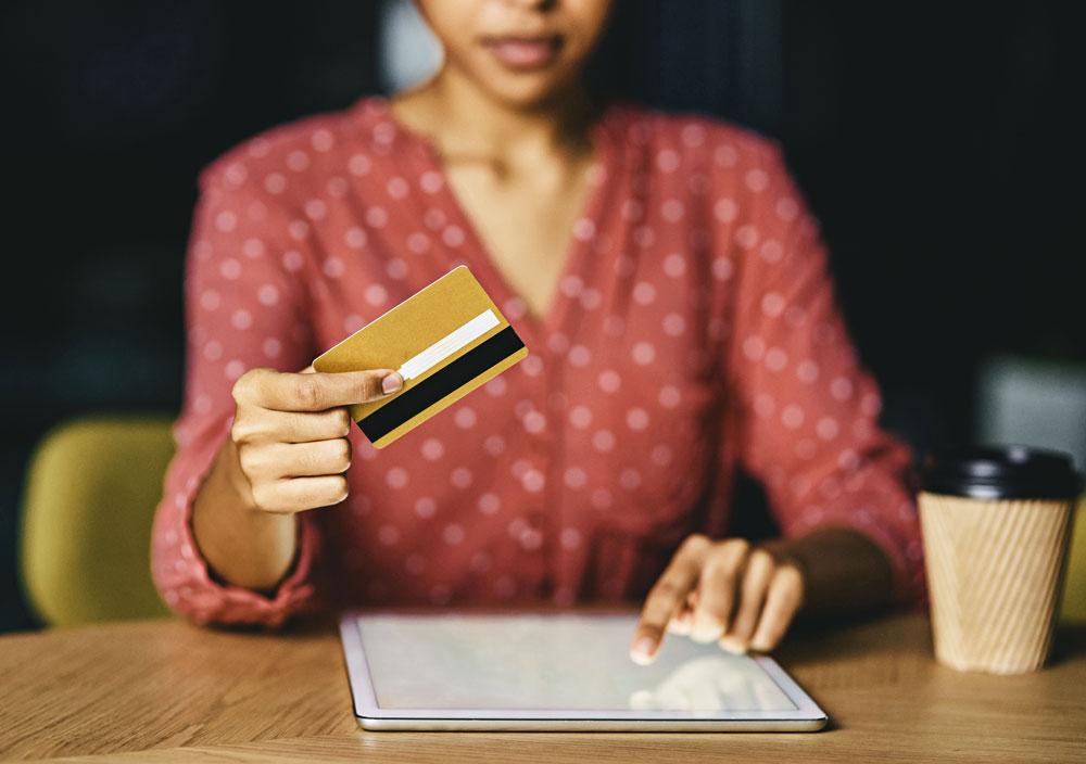 woman-accepting-credit-card Merchant Services